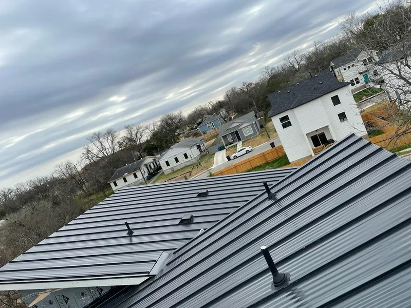 Standing seam metal roof panels with vents for Skylight Repair in Bennington